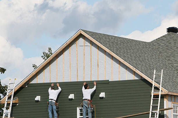 Professional Storm Damage Siding Repair technician working in Jones Mills, PA